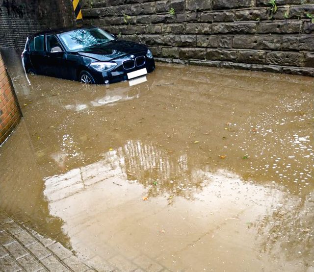 BMW in a flooded tunnel